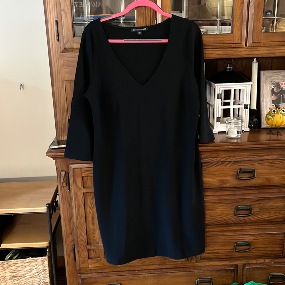 Black 3/4 sleeved mid length dress. NWT